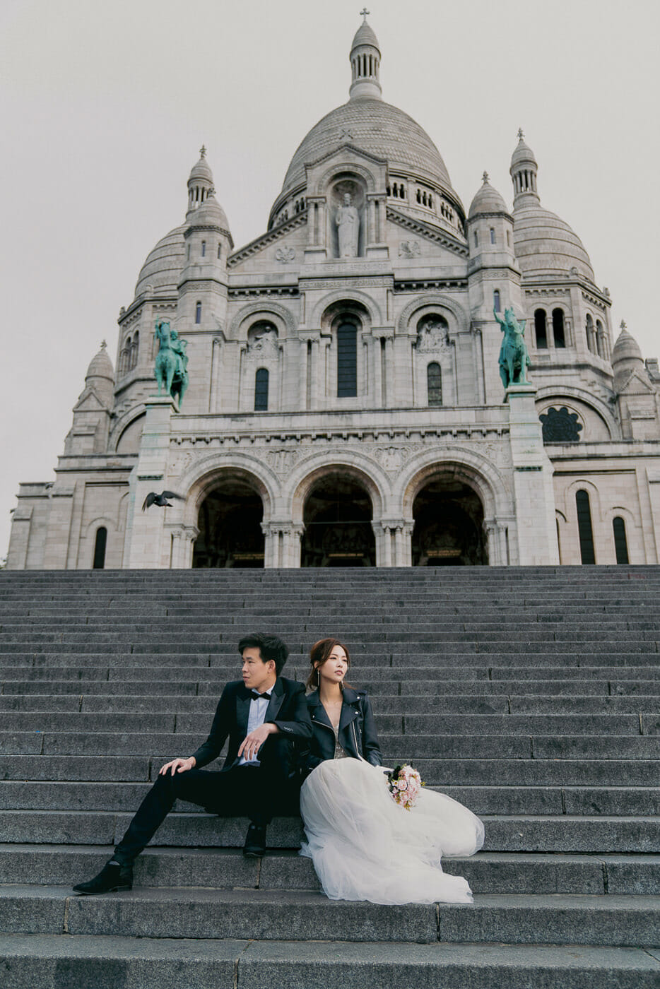 Stylish Paris pre-wedding photos at Montmartre below Sacre Coeur at sunrise