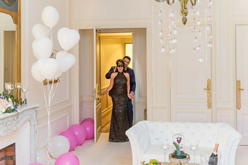 Romantic Paris proposal ideas blindfold and surprise hotel room decoration