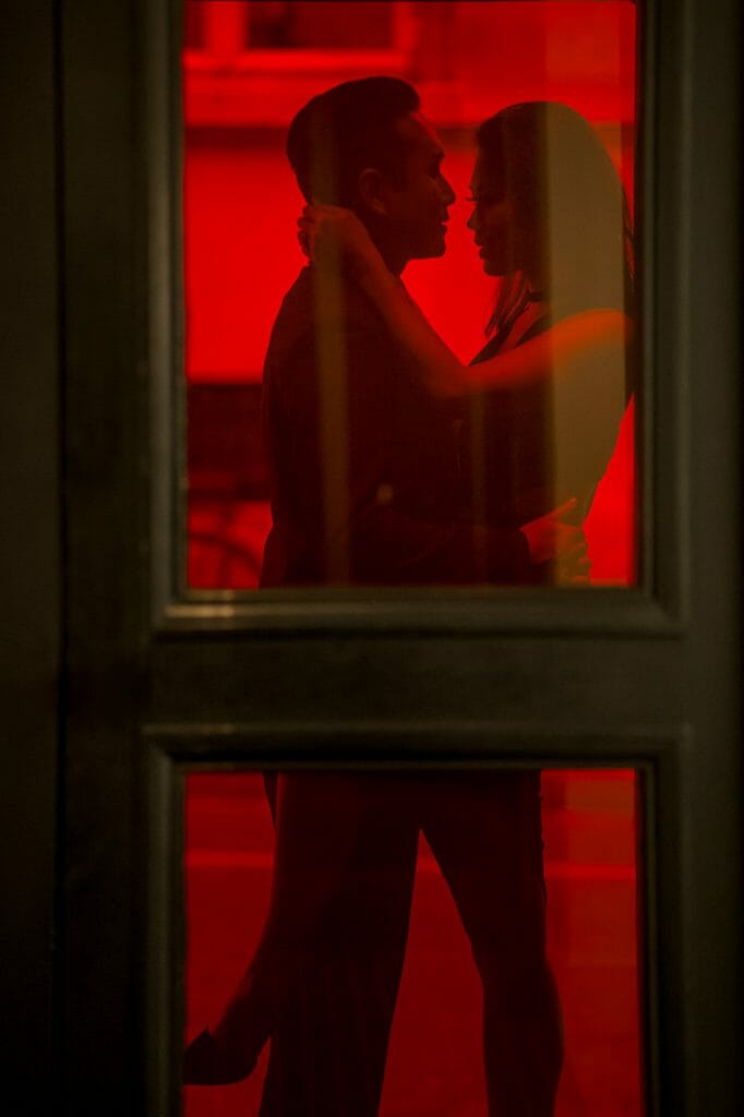 Sexy couple photos in Paris at a chic boutique hotel