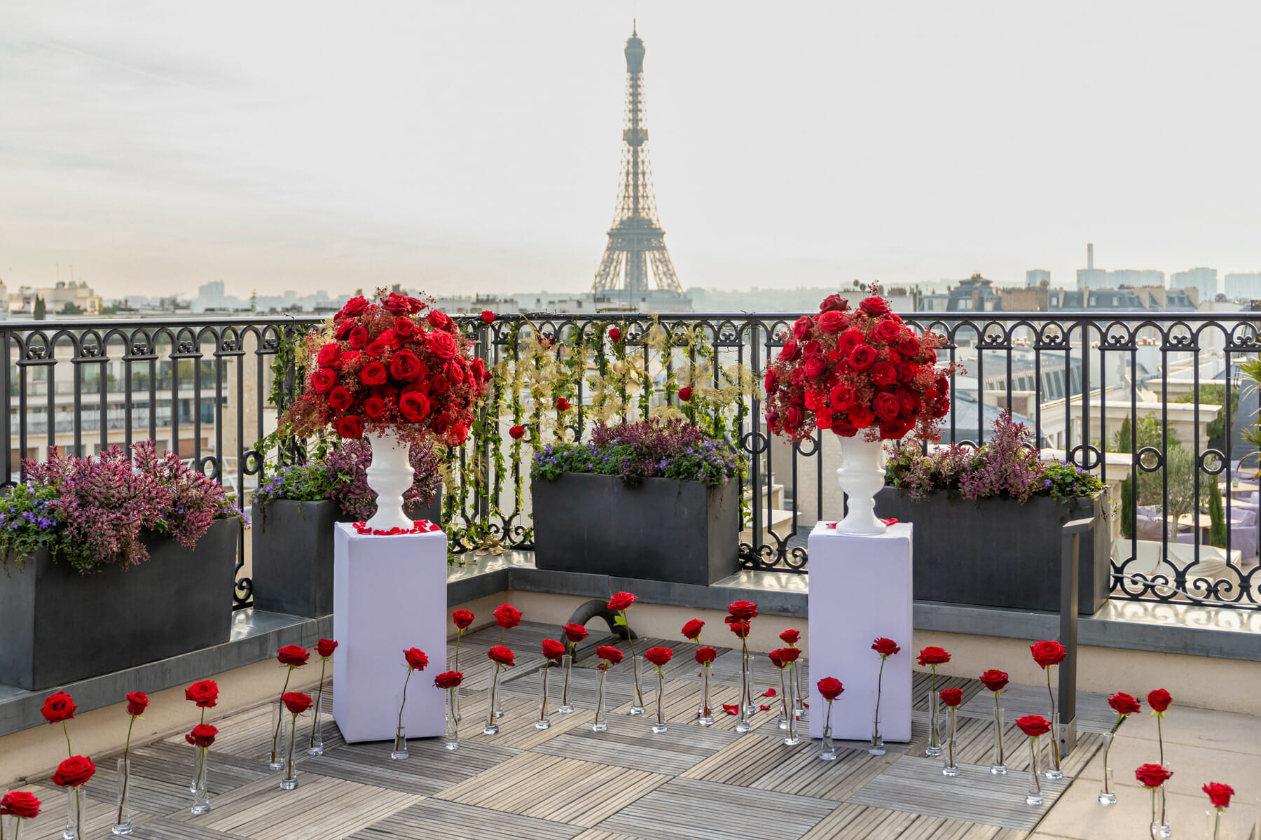 Secret Table Peninsula Paris proposal with stunning red Floral Arrangements made of roses