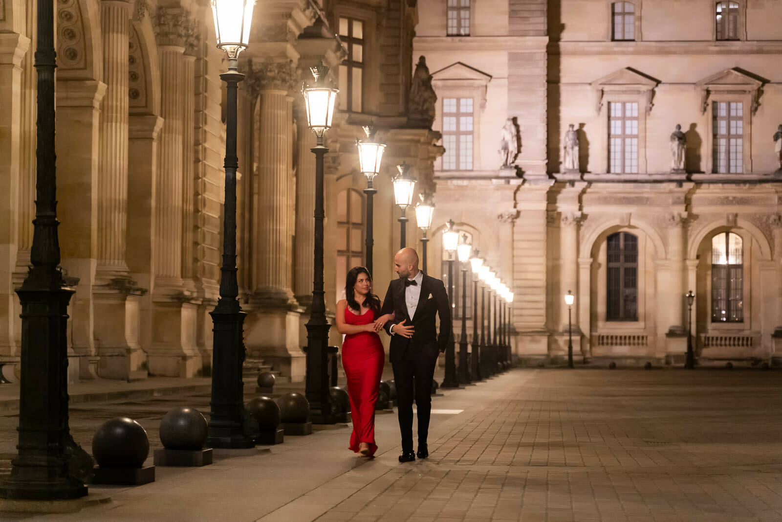 elegant Paris engagement photoshoot at night the Louvre Museum