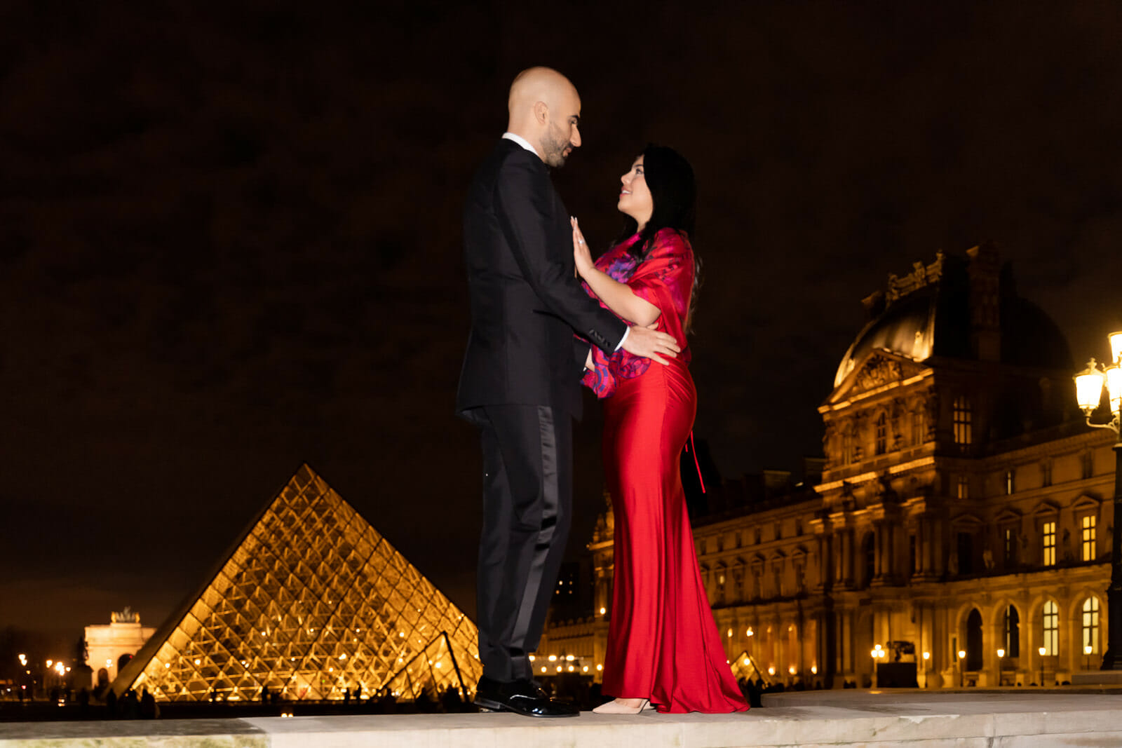 elegant Paris engagement photoshoot at night at the Louvre Museum