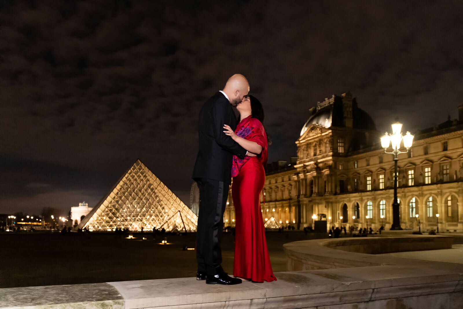 Super romantic Paris engagement photoshoot at night at the Louvre Museum