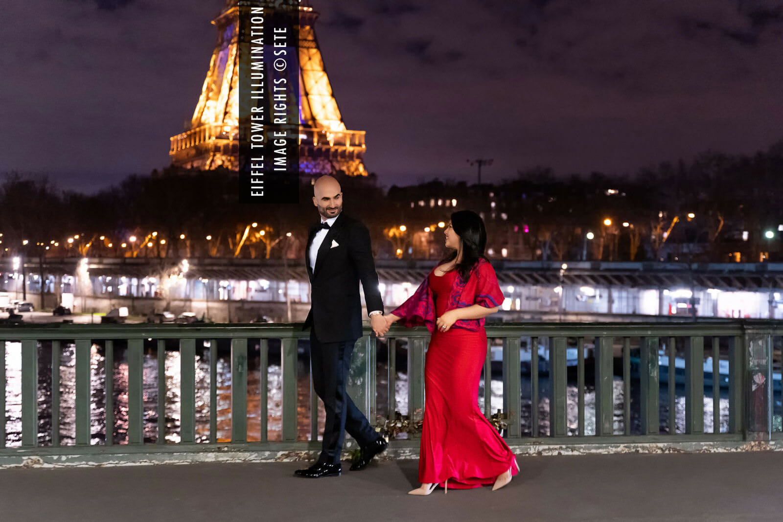 Eiffel Tower couple photos at night at Bir Hakeim Bridge