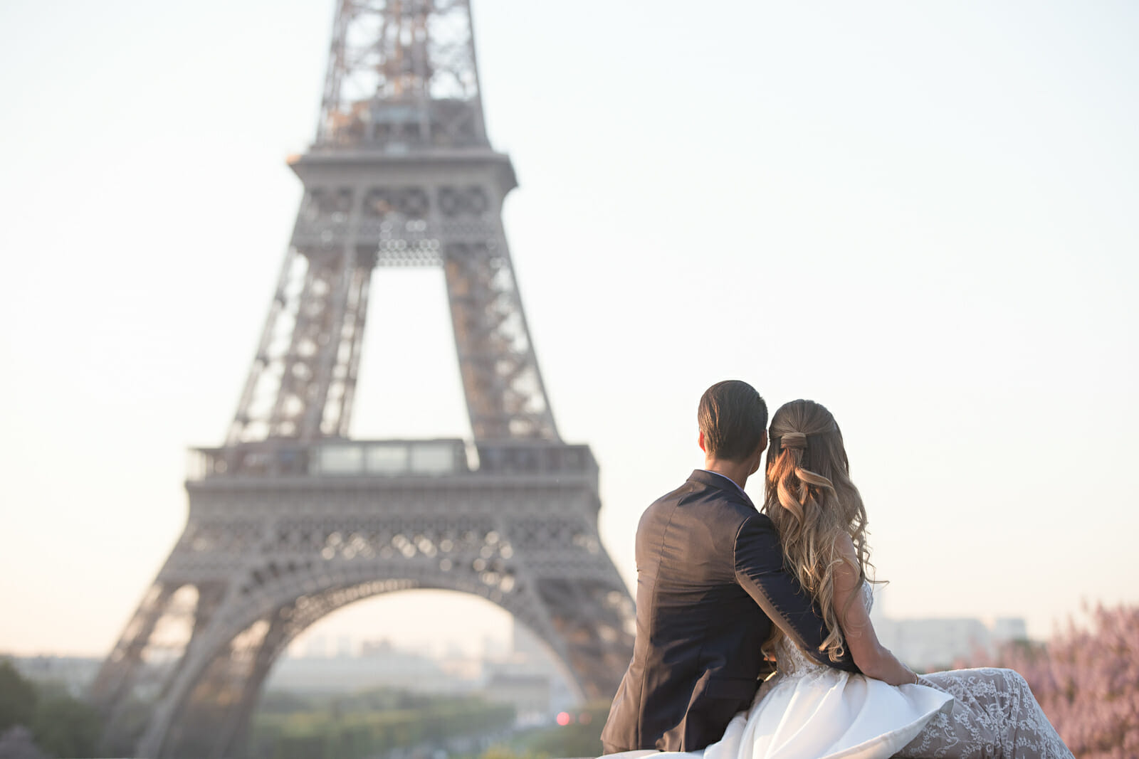 looking at Trocadero Eiffel Tower during pre wedding shoot