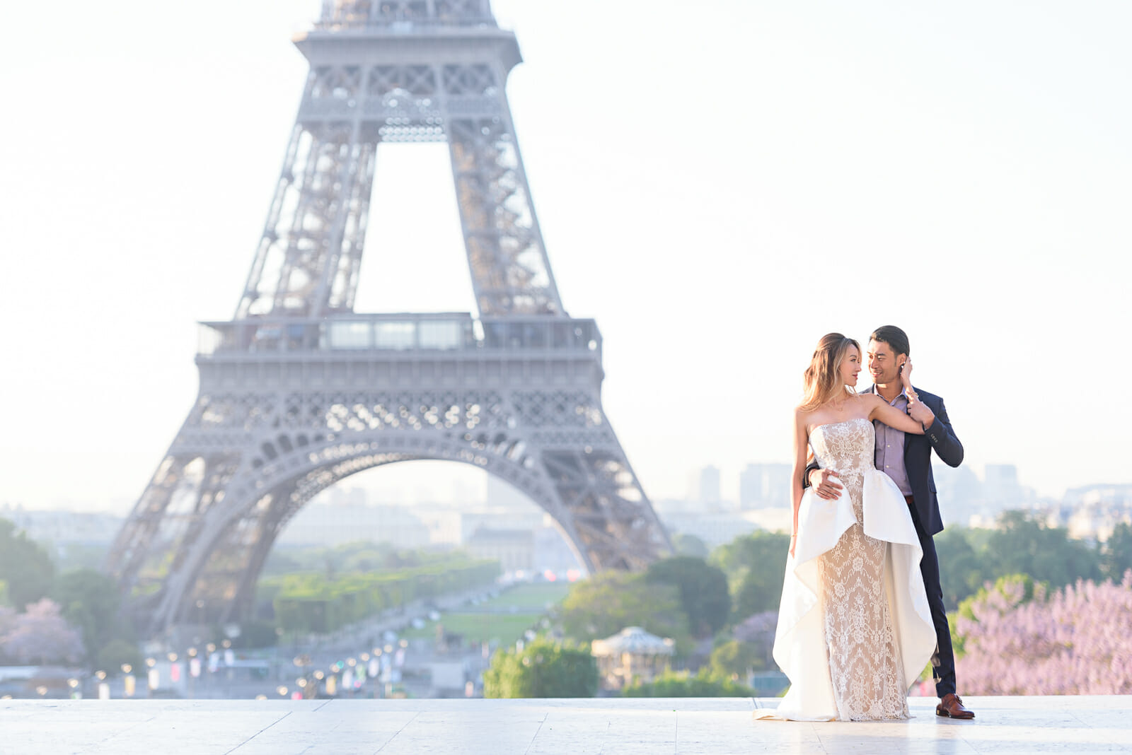 intimate hug during pre-wedding shoot at Trocadero Eiffel Tower
