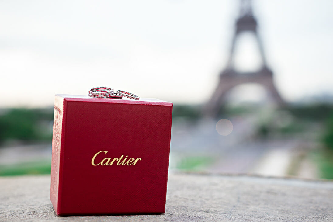 Cartier wedding rings photographed in front of the Eiffel Tower at Trocadero