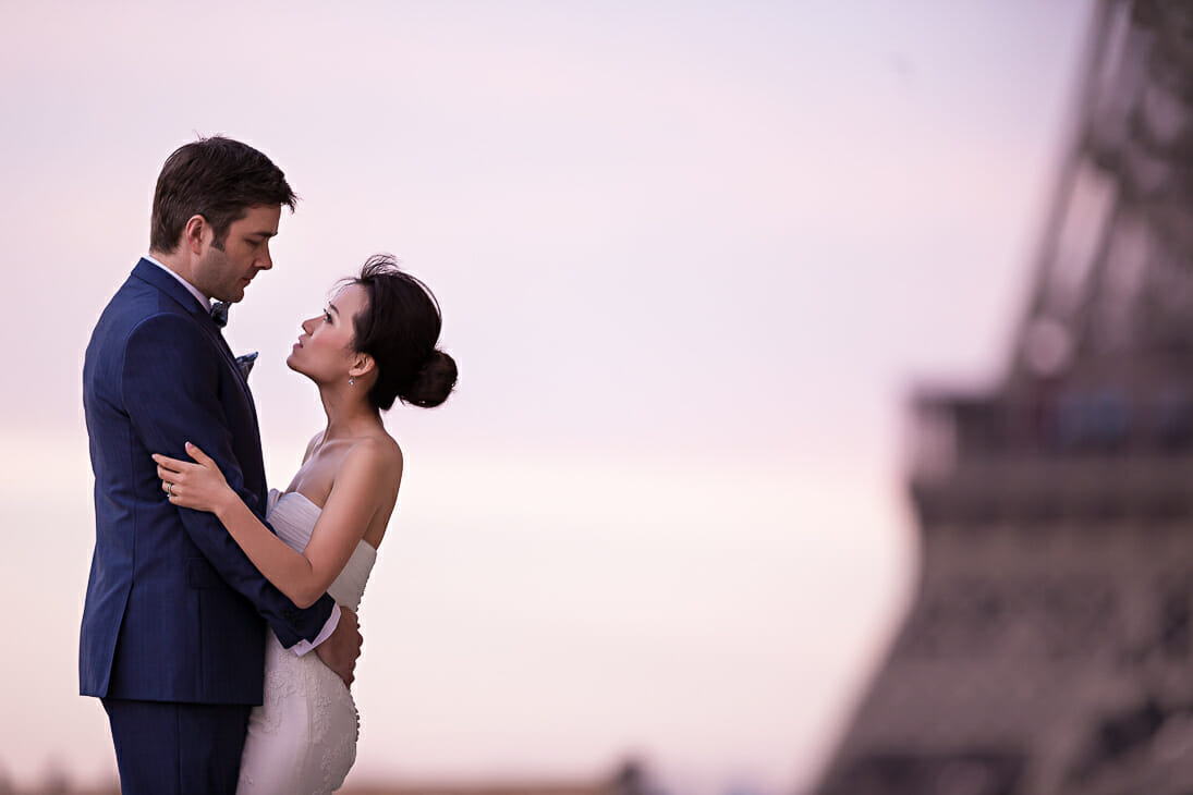 pre wedding shoot in paris romantic couple photo at the Eiffel Tower at sunrise