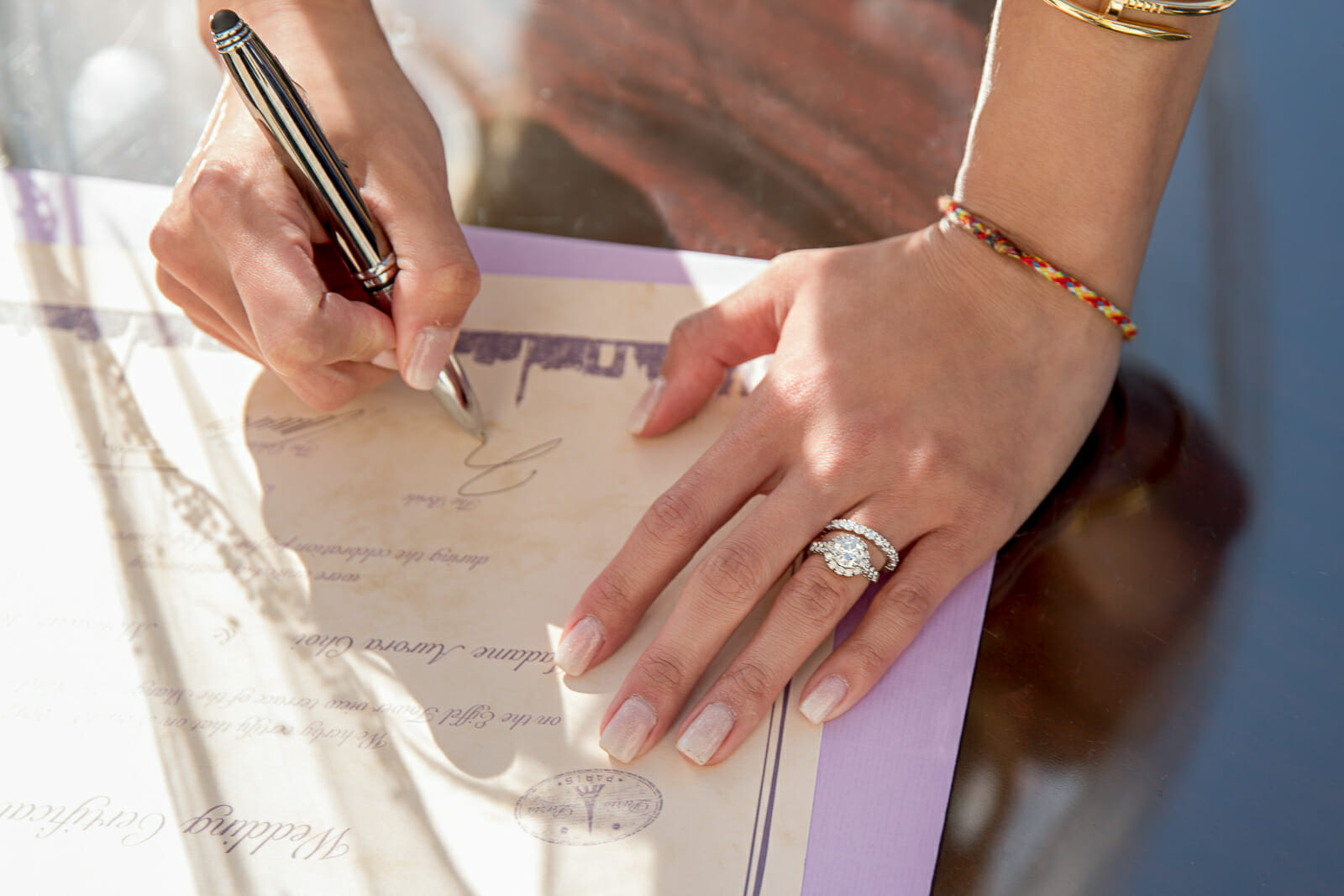 bride signing wedding sertificate at shangri la