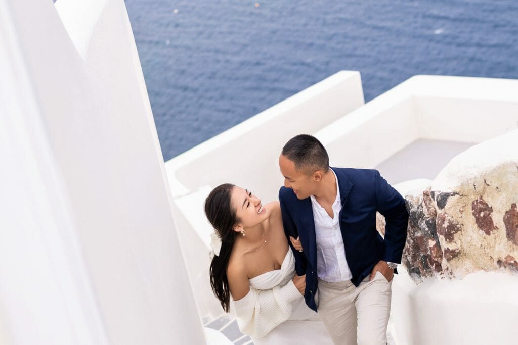Playful Santorini engagement photos