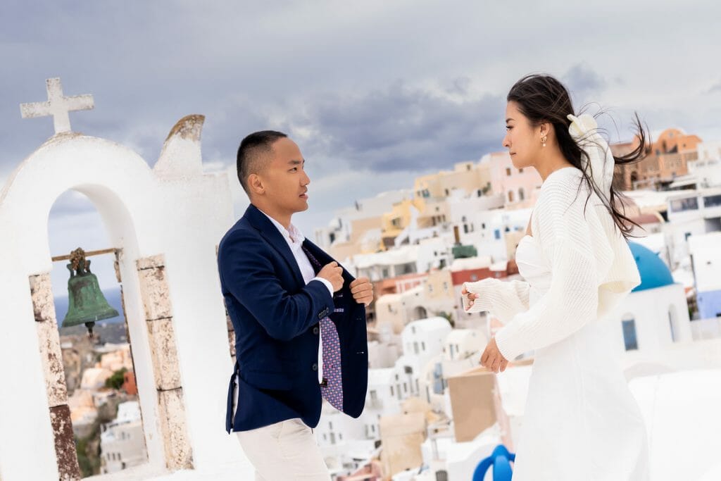 surprise proposal in Santorini on a famous church